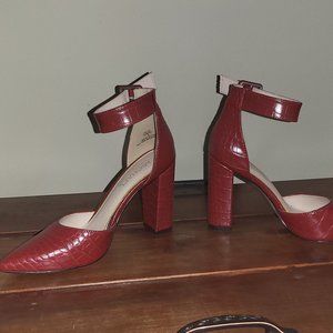Red alligator print heels